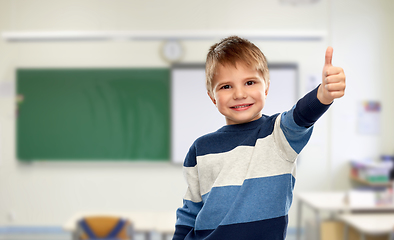 Image showing little boy showing thumbs up at school