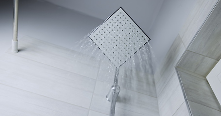Image showing Water flowing from shower head 120 fps slow motion closeup footage