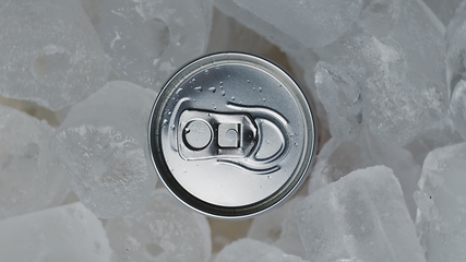 Image showing Aluminum Soda Tin Can Rotating in cool Ice motion footage