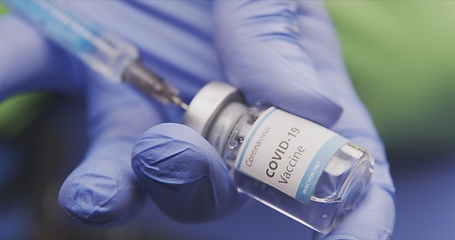 Image showing Vaccine in human hands closeup footage