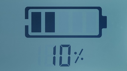 Image showing Charger displayin battery at 10 percent