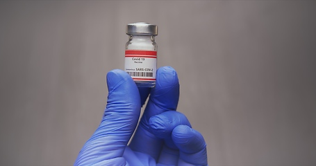 Image showing Vaccine in human hands closeup footage