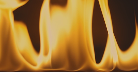 Image showing Fire dancing against dark background 120fps slow motion loopable footage