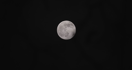 Image showing Full moon with clouds moving in front of it