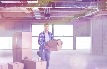 Image showing portrait of young businessman on construction site