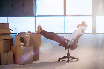 Image showing young business man taking a break on construction site