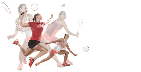 Image showing Young women playing badminton on white background