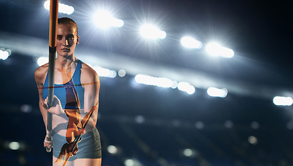 Image showing Female pole vaulter training or performing at the stadium