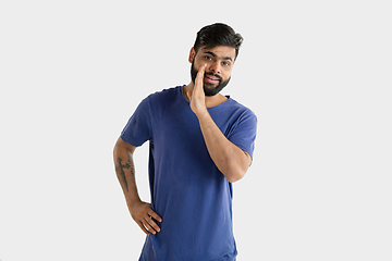 Image showing Portrait of young man isolated on white studio background