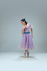 Image showing Contemporary ballroom dancer on grey studio background