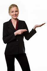 Image showing Woman pointing and holding