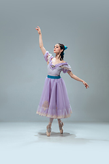 Image showing Contemporary ballroom dancer on grey studio background