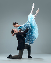 Image showing Contemporary ballroom dancers on grey studio background