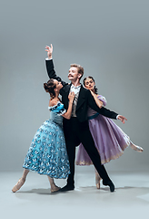 Image showing Contemporary ballroom dancers on grey studio background