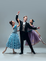 Image showing Contemporary ballroom dancers on grey studio background