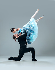 Image showing Contemporary ballroom dancers on grey studio background