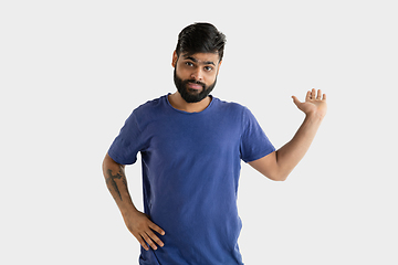 Image showing Portrait of young man isolated on white studio background