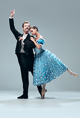 Image showing Contemporary ballroom dancers on grey studio background