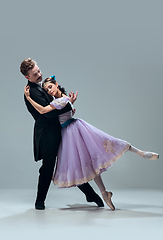 Image showing Contemporary ballroom dancers on grey studio background