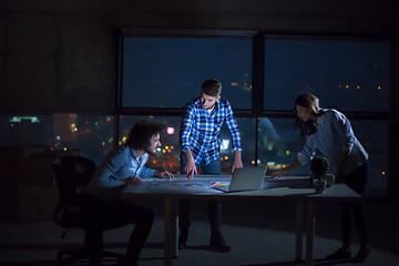 Image showing business people on construction site  in new startup office at n