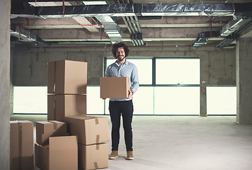 Image showing portrait of young businessman on construction site