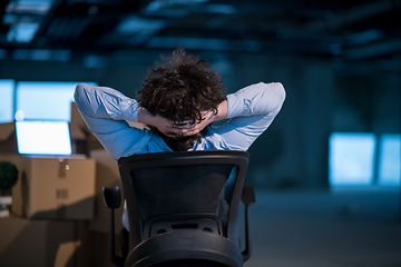 Image showing young business man taking a break on construction site