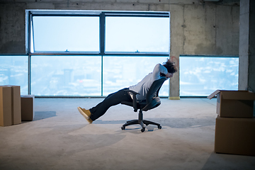 Image showing young business man taking a break on construction site