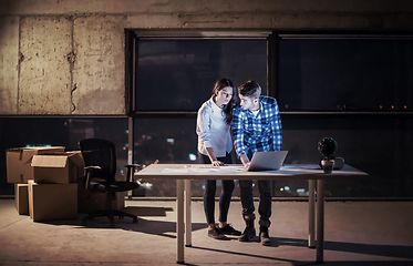 Image showing business people on construction site  in new startup office at n