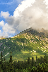 Image showing Polish Tatra mountains summer landscape with blue sky and white clouds.