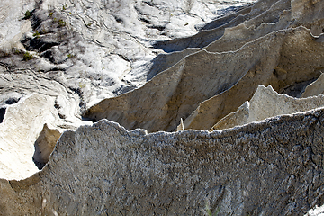 Image showing Water eroded large mining Spoil tip hill