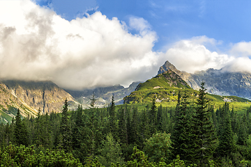 Image showing Polish Tatra mountains summer landscape with blue sky and white clouds.