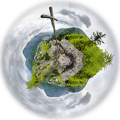 Image showing Wooden cross on mountain peak. Tiny planet