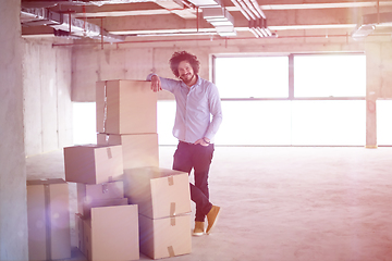 Image showing portrait of young businessman on construction site