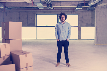 Image showing portrait of young businessman on construction site