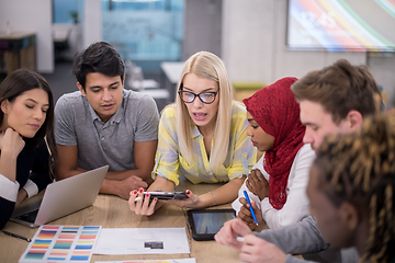 Image showing Multiethnic startup business team having meeting