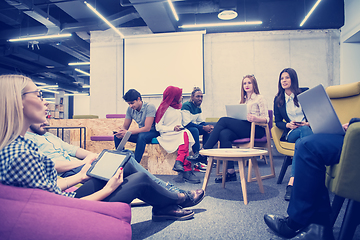 Image showing Multiethnic startup business team having meeting