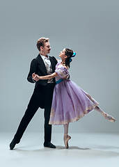 Image showing Contemporary ballroom dancers on grey studio background