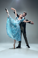 Image showing Contemporary ballroom dancers on grey studio background