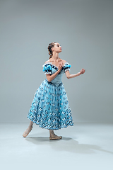 Image showing Contemporary ballroom dancer on grey studio background