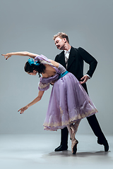 Image showing Contemporary ballroom dancers on grey studio background