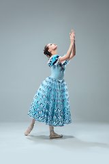 Image showing Contemporary ballroom dancer on grey studio background