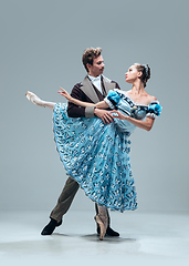 Image showing Contemporary ballroom dancers on grey studio background