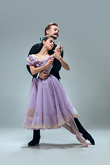 Image showing Contemporary ballroom dancers on grey studio background