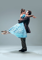 Image showing Contemporary ballroom dancers on grey studio background