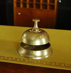 Image showing Service ring bell on a hotel desk 