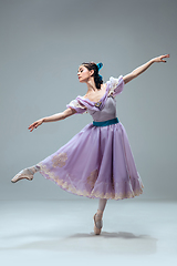 Image showing Contemporary ballroom dancer on grey studio background