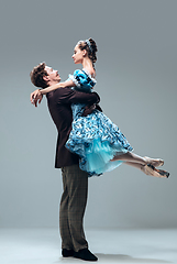 Image showing Contemporary ballroom dancers on grey studio background