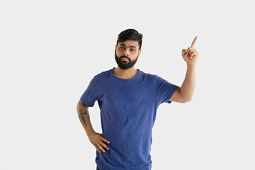 Image showing Portrait of young man isolated on white studio background