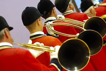 Image showing musicians playing music on hunting horn 