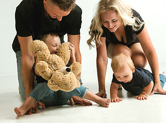 Image showing Young family spending time together and smiling